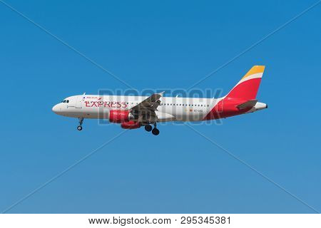 Madrid, Spain - May 22, 2017: Iberia Express Airbus 320 Is Landing In Madrid Barajas Airport On May 