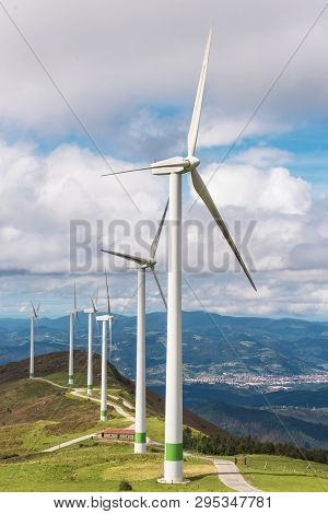Renewable Energy. Wind Turbines, Eolic Park In Scenic Landscape Of Basque Country, Spain.