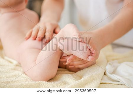 Famel Hands Massage Gently Baby, Close Up