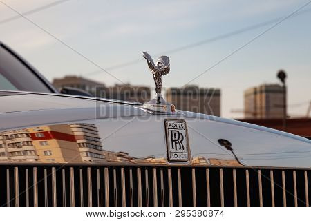Novosibirsk, Russia - 04.11.2019: Front View Of Emblem Spirit Of Ecstasy Of New A Very Expensive Rol