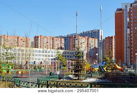 Playground On The Background Of Residential Buildings In Krasnogorsk