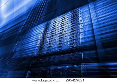 Point Of Bottom View Of Array Disk Storage In Data Center With Depth Of Field In Cool Blue Tone