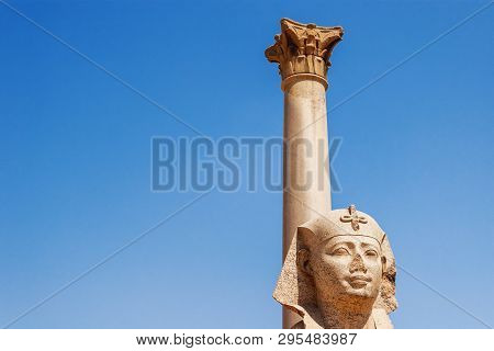 Pompeys Pillar, Roman Triumphal Column, With Two Sphinx Statues Located At The Serapeum Of Alexandri