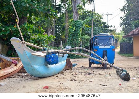 Fishing Boat And Tut-tuk Near The Shore In Sri Lanka