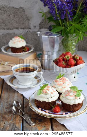 Chocolate Cupcake With Vanilla Cream And Strawberries. Vintage Style