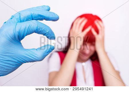 Doctor Holding A Headache Pill That Relieves Stress And Migraine, Painkiller, Antispasmodic