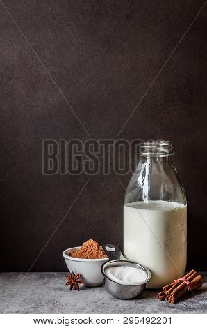 Hot Chocolate Ingredients Near A Blackboard To Whrite The Recipe On, Copy Space For Your Text