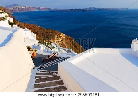 Steps And Blue Deep Waters Of Aegan Sea, Beautiful Details Of Santorini Island, Greece