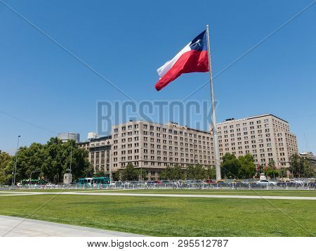 Santiago De Chile, Chile - January 26, 2018: Chileans Walking Near The Giant Flag On Avenida La Alam