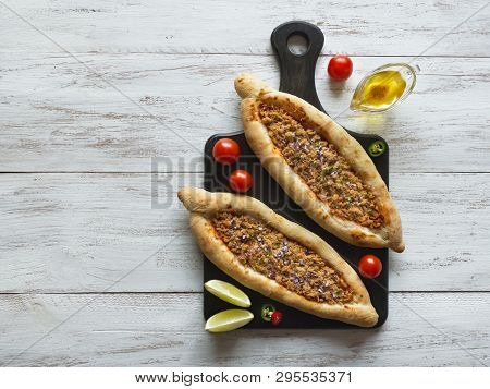 Arabic Pizza Lahmacun On White Wooden Background