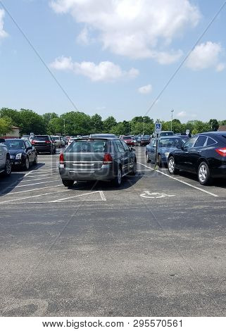 Car Vehicle Improperly Illegally Parked In A Handicapped Parking Spot, Parking Lot