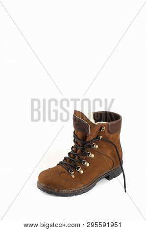 Beige Woman Long Boot Shoe Isolated On White Background. Fashionable Boots For Women May Exhibit All