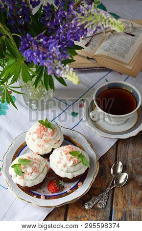 Chocolate Cupcake With Vanilla Cream And Strawberries. Vintage Style