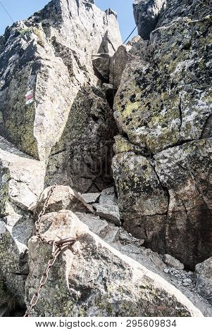 Difficult Hiking Trail Secured By Chain On Tri Kopy Peak On Rohace Mountain Group In Western Tatras 