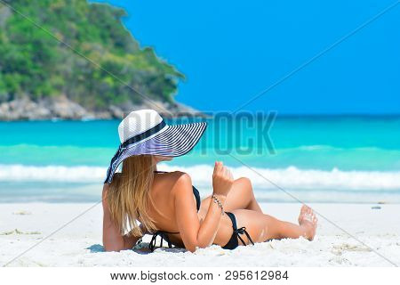 Sexy Woman In Bikini Enjoy Tropical Vacation. Girl In Hat Relaxing On Summer Holiday. Girl With Perf