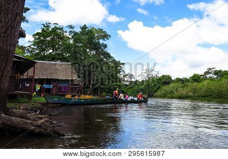 Madidi River, Bolivia - May 5: Instant Of A Boat With People Sailing In The River, On May 5, 2015 In