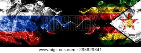Russian Vs Zimbabwe, Zimbabwean Smoke Flags Placed Side By Side. Thick Colored Silky Smoke Flags Of 