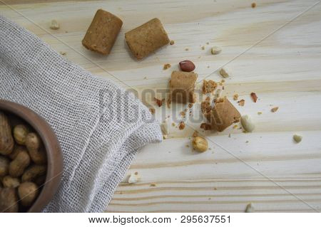 Peanut. Peanuts On Wooden Background. Cackground Of Wood And Peanuts On Top.