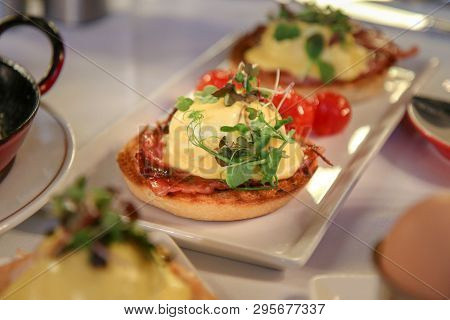 Egg Benedict With Ham, Spinach And Hollandaise Sauce