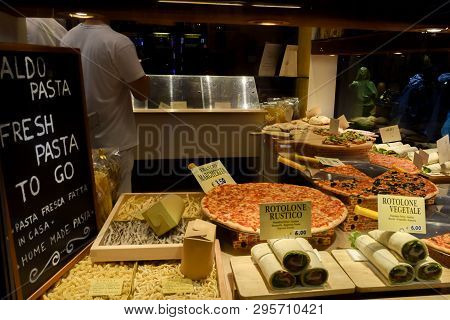 Venice, Italy - November 2, 2018: Italian Pizzaria Restaurant Window Display With Vegetable Rolls, P