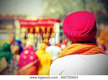 Sikh Man With Turbant Called Dumalla During A Religious Celebration With Old Toned Effect