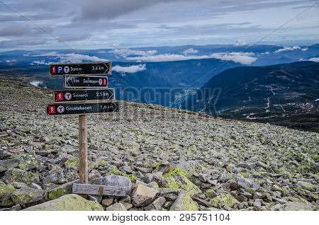 View From Gaustatopen With Trekking Direction Sign In The Foreground