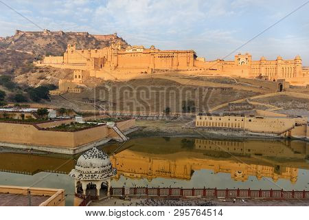 Amber Fort And Palace In Maotha Lake At Morning. Jaipur. Rajasthan. India