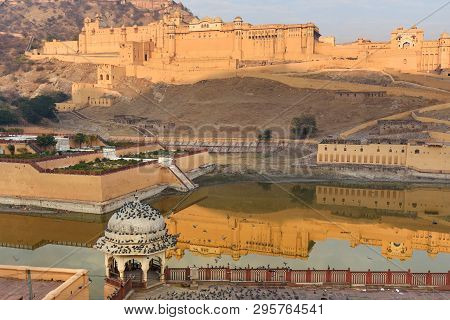 Amber Fort And Palace In Maotha Lake At Morning. Jaipur. Rajasthan. India