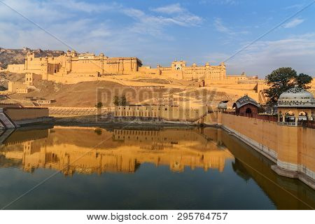 Amber Fort And Palace In Maotha Lake At Morning. Jaipur. Rajasthan. India