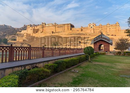 Amber Fort And Palace In Maotha Lake At Morning. Jaipur. Rajasthan. India