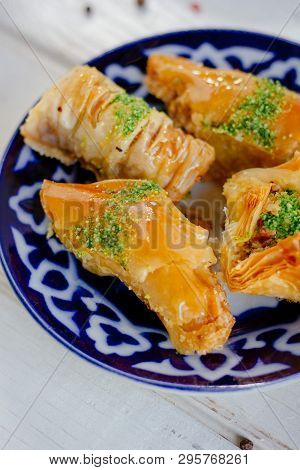 Asian Dessert Baklava Or Pahlava On A Traditional Oriental Plate, Great Image For Your Needs.