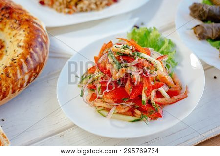 Achik-chukchuk Salad Made From Fresh Vegetables, On White Plate, Great Image For Your Needs.
