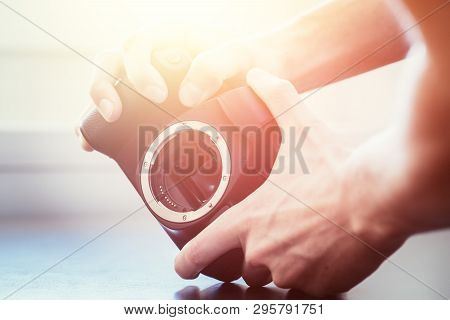 Photographer Is Using A Professional Camera, Open Sensor And Sunlight