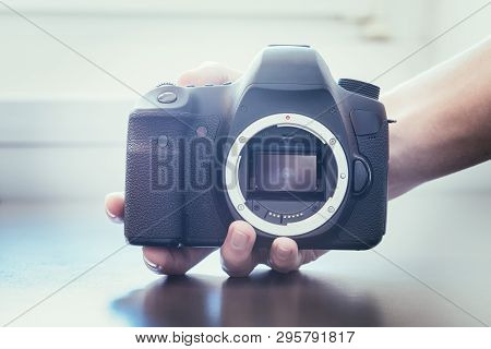 Photographer Is Using A Professional Camera, Open Sensor
