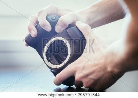 Photographer Is Using A Professional Camera, Open Sensor