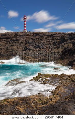 A Light House At The Southern End Of Grand Canaria, One Of The Many Islands Of The Canary Islands.