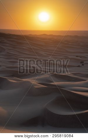 A Sunset In The Arabian Desert About An Hour Drive From Dubai, Uae.