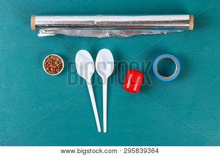 Diy Cinco De Mayo Maracas From Eggs, Spoons And Cereals On A Green Background. Gift Idea, Decor Cinc
