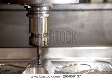 The  Cnc Milling Machine Cutting The Mould Part With The Solid Ball End Mill Tool.the Hi-technology 