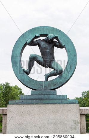 Oslo, Norway -jule, 2016: Sculpture Of Man Inside A Circle At Vigeland Park In Oslo. Sculpture By Gu