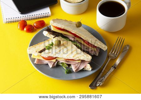 Snacks, Fast Food Concept. Eatting At Work Place. Fresh Club Sandwich, Vegetables, Coffee, Potato Ch