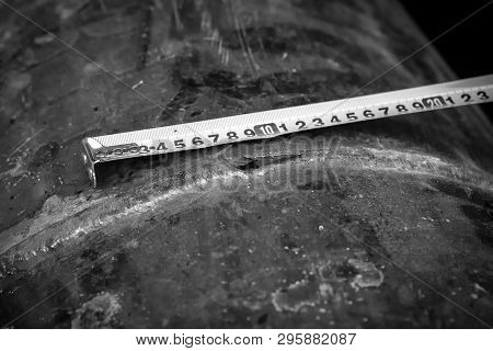 Damage Measurement. Fuel Line. Defect - A Crack In The Pipeline Pipe. Photographed In Ukraine. Kiev 