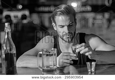 Heavy Drinking Is Bad. Alcoholic Man Drinking At Bar Counter. Man Drink Strong Alcoholic Beverage An