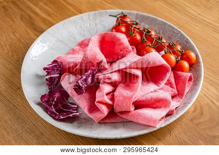 Lavash with tomatoes (soft, thin unleavened flatbread)