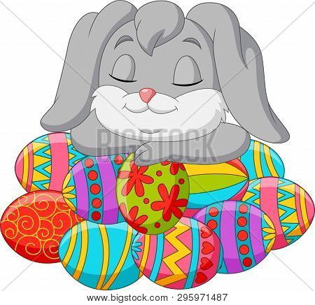 Cute Rabbit Cartoon Sleeping On Easter Eggs