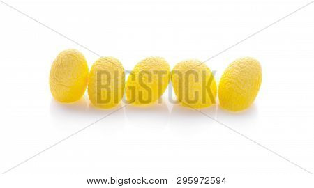 Yellow Thai Silkworm Cocoons Pile Isolated On White Background