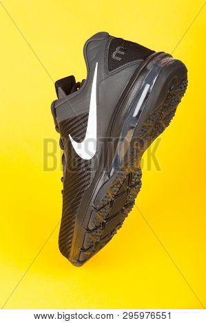 Varna, Bulgaria Studio Shot - March 15, 2019 : Nike Air Max Full Ride Sport Shoe, On Yellow Backgrou