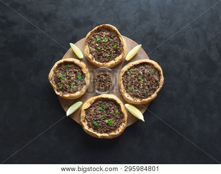 Traditional Lebanese Meat Pies On A Black Table. Top View.
