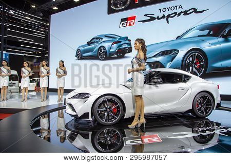 Nonthaburi, Thailand - April 3, 2019: Presenters Introduce Toyota Supra In Motor Show 2019