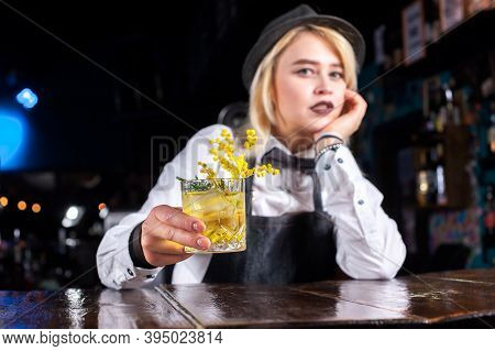 Girl Barman Mixes A Cocktail In The Brasserie